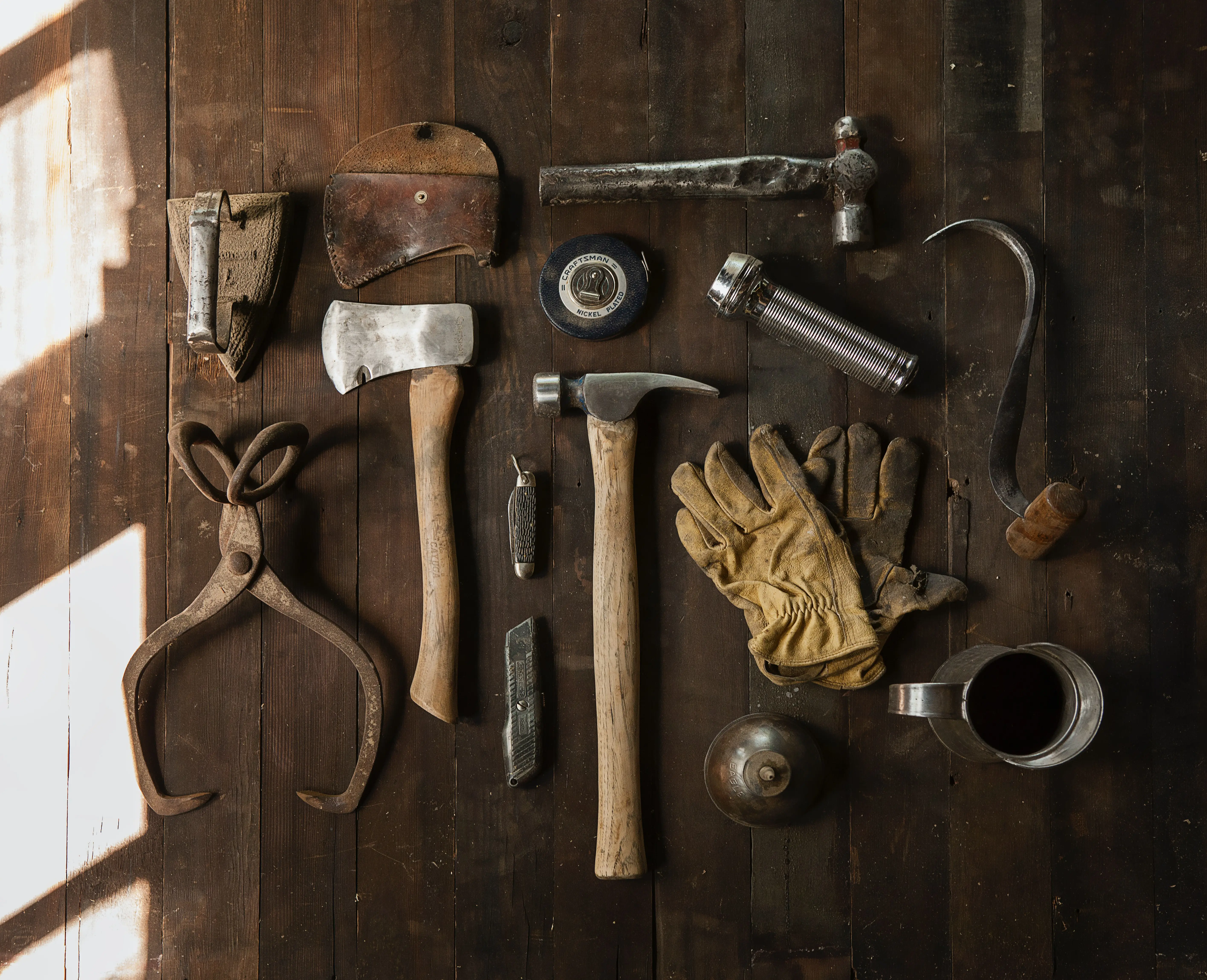 Tools laid out on a wooden table